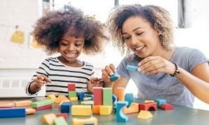 Mother and daughter playing