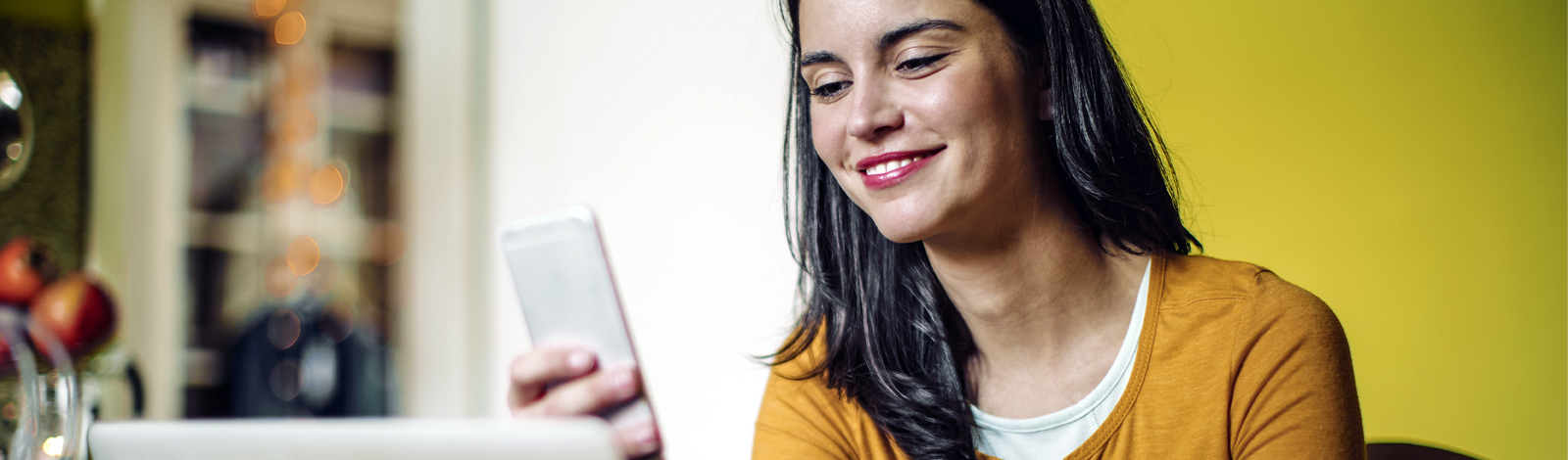 Woman smiling while on computer