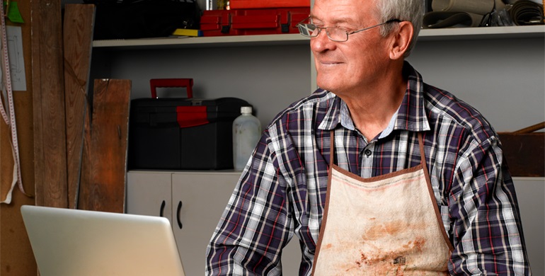 Man working and using a laptop