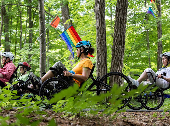 Two people on pedal bikes having fun