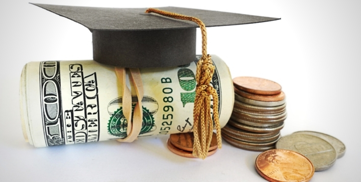 Graduation cap above money