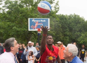 Mayor Sarno and John Heaps jump ball at Greenleaf