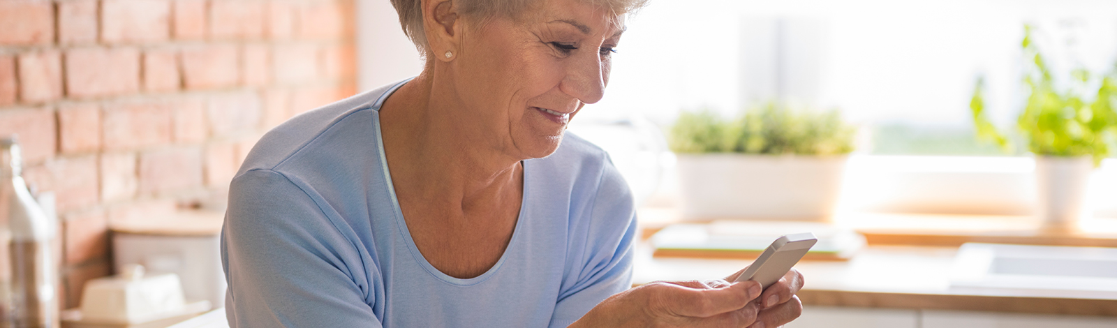 Woman checking account balance on phone