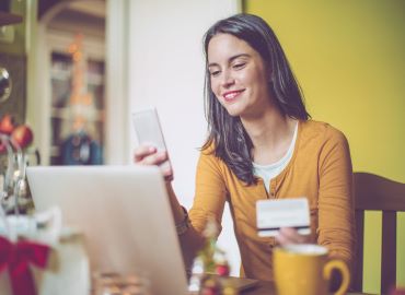 Women smiling at phone