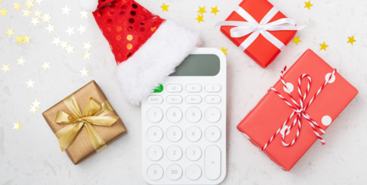 Presents and calculator for holiday budgeting