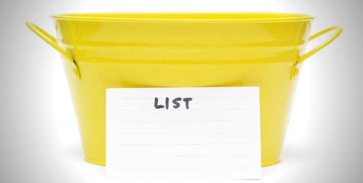 Yellow bucket with the word list on a piece of paper