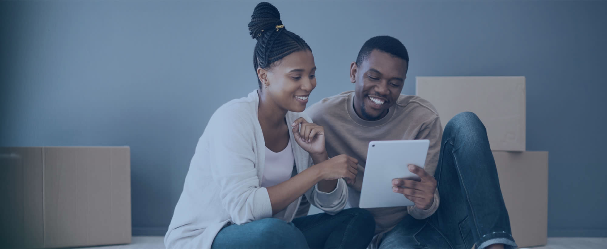 Happy young couple planning home buying